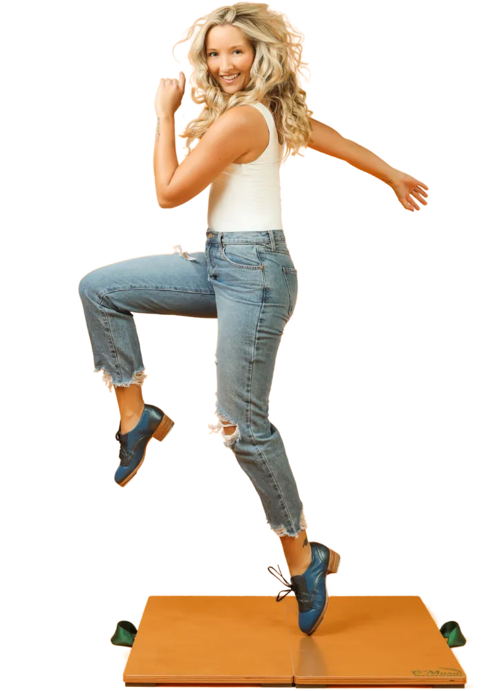 Female tap dancer in casual clothing tap dancing on 2.5 x 2 folding maple sprung floor